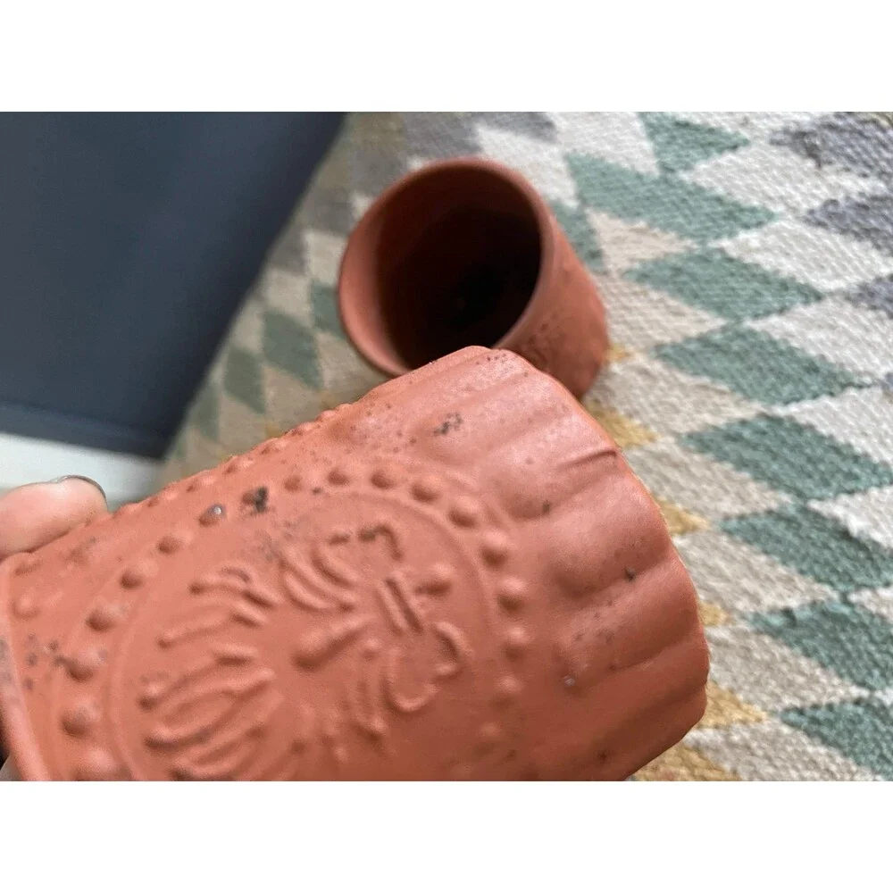 Painted small terra cotta style planters set of 4
